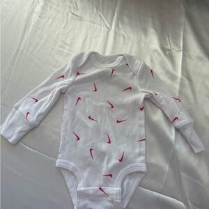 Nike Baby Bodysuit in White with Pink Swooshes